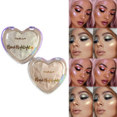 Iluminador compacto Merry Color con hiperpigmentación en forma de corazon.